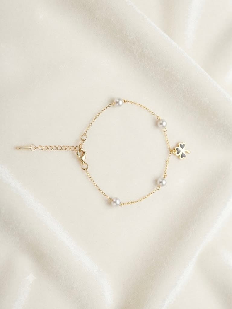Pearl & Black Clover Station Bracelet